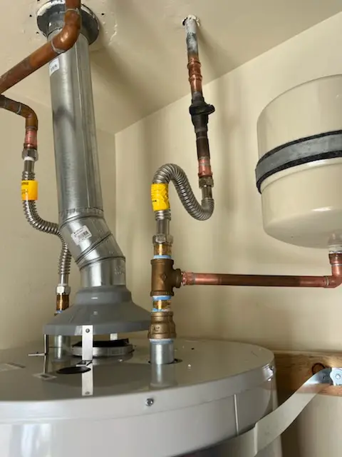 Water heater installation and plumbing repair in Locust